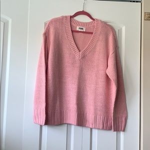 Pink knitted sweater